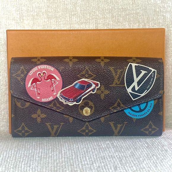 Louis Vuitton Handbags - LIMITED EDITION Louis Vuitton Monogram World Tour Sarah Wallet